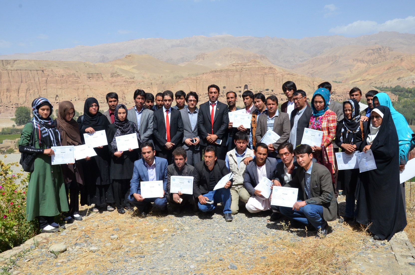 Hamidullah Arefi, secretary South Asia Foundation-Afghanistan distributing certificates on cultural heritage in Bamyan