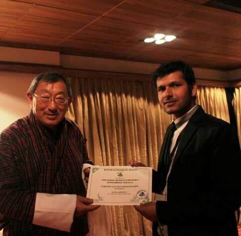 Presentation by Mr Sunil, Madanjeet Singh Group Scholarship of South Asia Foundation  UMCSAFS, recieving certiicate from President of Bhutan